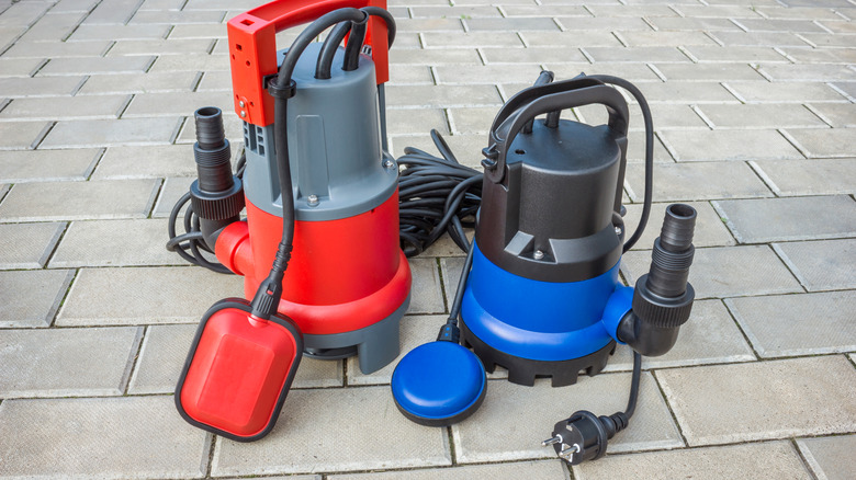 Submersible basement water pumps in red and blue colors