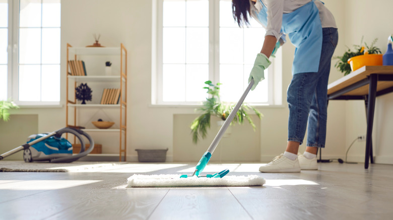 woman cleaning the floor