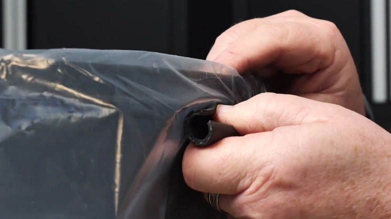 Segment used to attach garbage bag to trash can