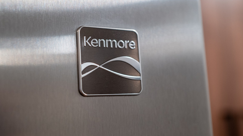 Closeup of a Kenmore logo on stainless steel