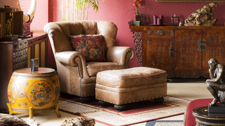 red living room with brown armchair