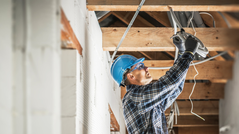 Pulling thick electrical cable in home's ceiling