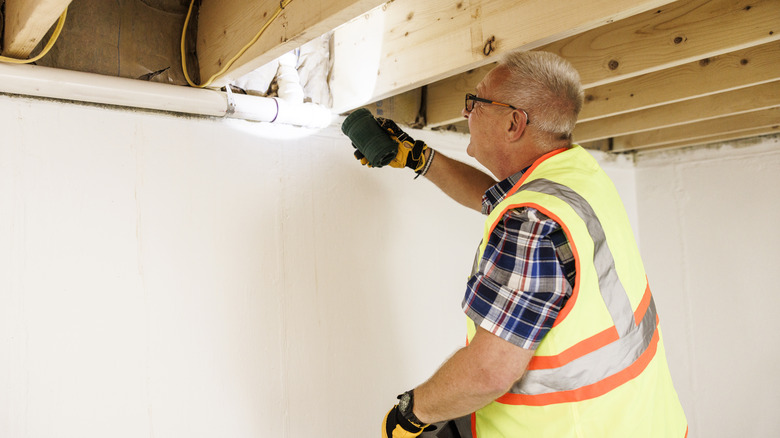 Inspecting joists and subfloor