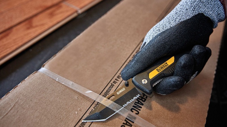 Opening a box with DeWalt ball-bearing-assist pocket knife