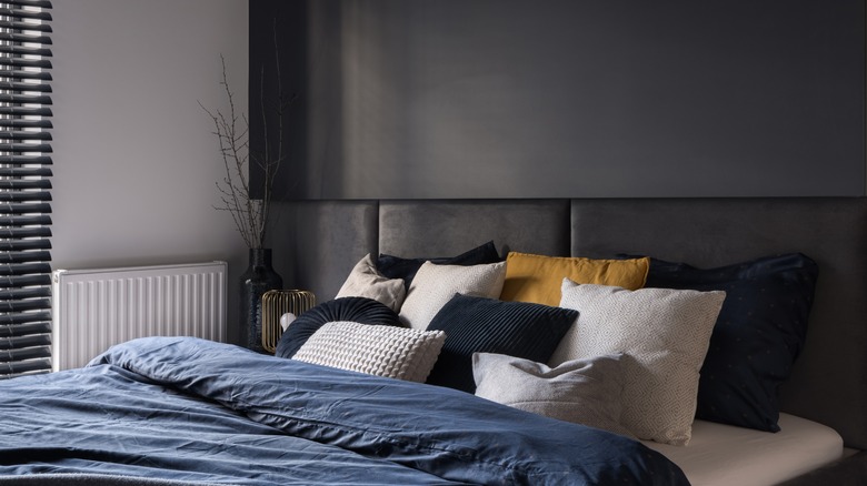 Bedroom with charcoal gray wall