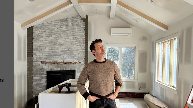 Nate Berkus standing in an in-progress house