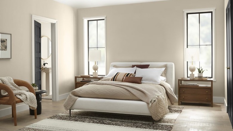 a neutral, modern bedroom with even better beige painted on the walls