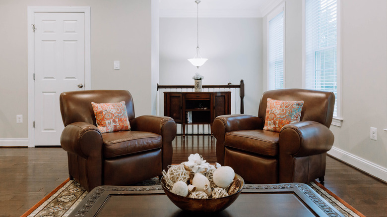 two large leather reclining chairs in living room