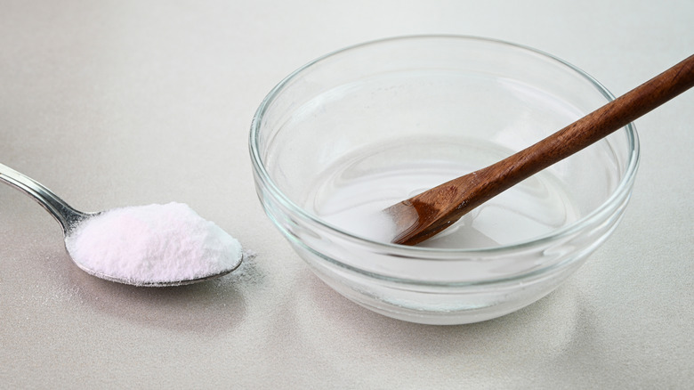 A bowl of baking soda mixed with water