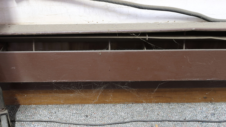 A baseboard heater that needs maintenance