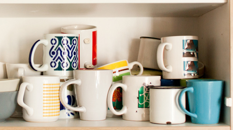 mugs in cupboard