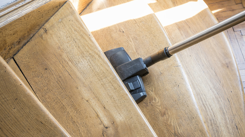 vacuum on wooden stairs