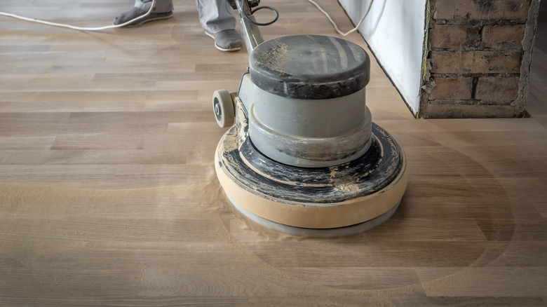 Large sanding machine on a floor