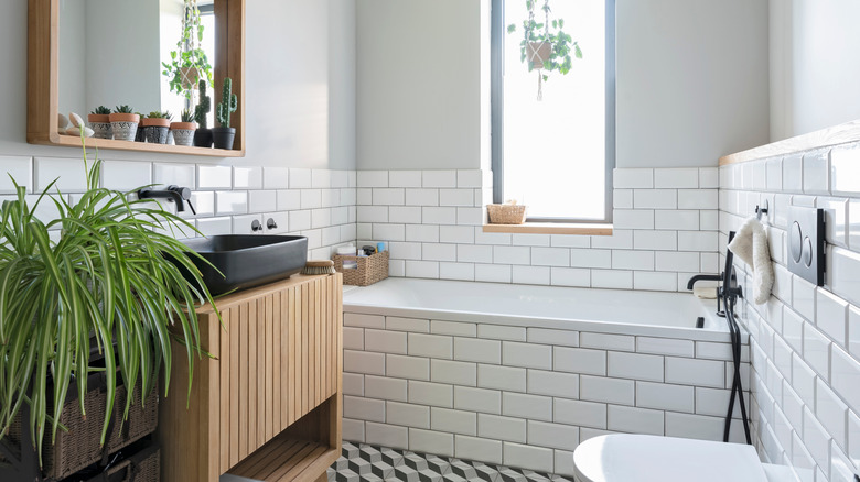 bathroom with white subway tiles