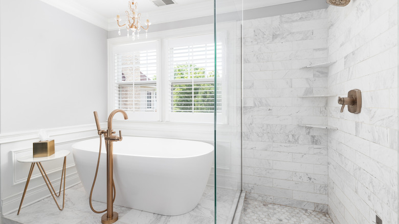 shower with marble plank tiles