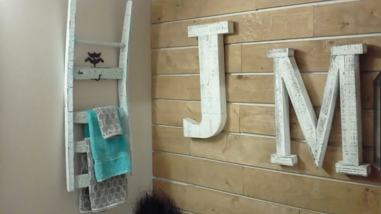 Towel rack made from a broken chair