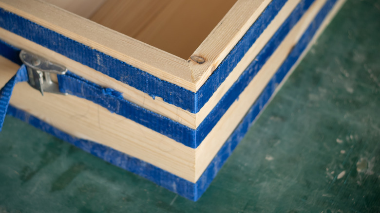 A tightly cut and clamped mitered edge on a hand-made box