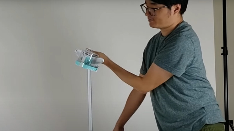 Justin Huang using Cup-A-Bug