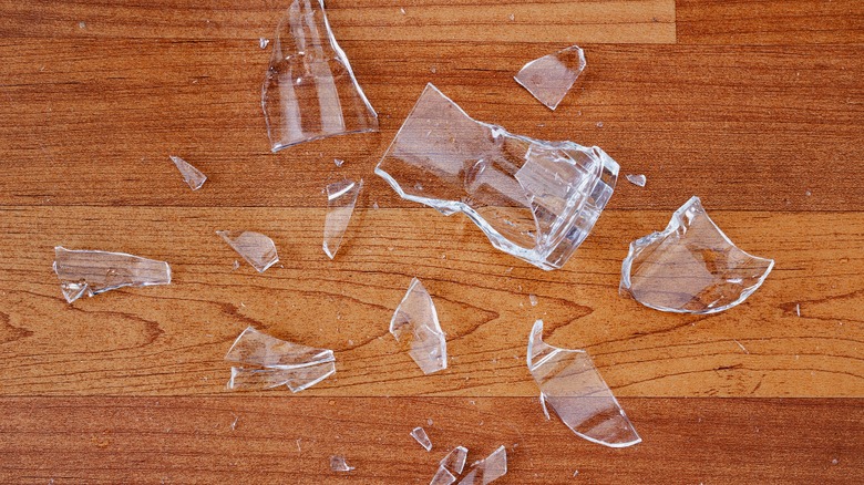 Broken glass on wood floor